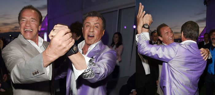 Arnold Schwarzenegger dancing with Sylvester Stallone in Cannes Film Festival at the premiere party for the action movie The Expendables 3, 2014.